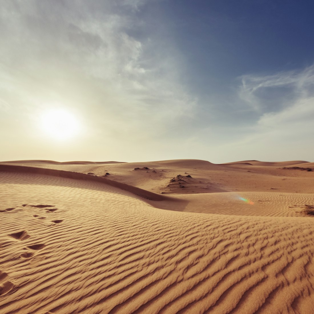Wind-formed desert sand in evening light